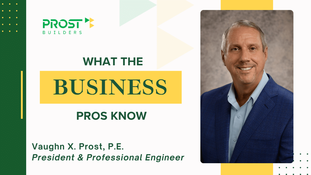Vaughn Prost posing for a blog post called What the Business Pros Know, man in a blue jacket with blue shirt